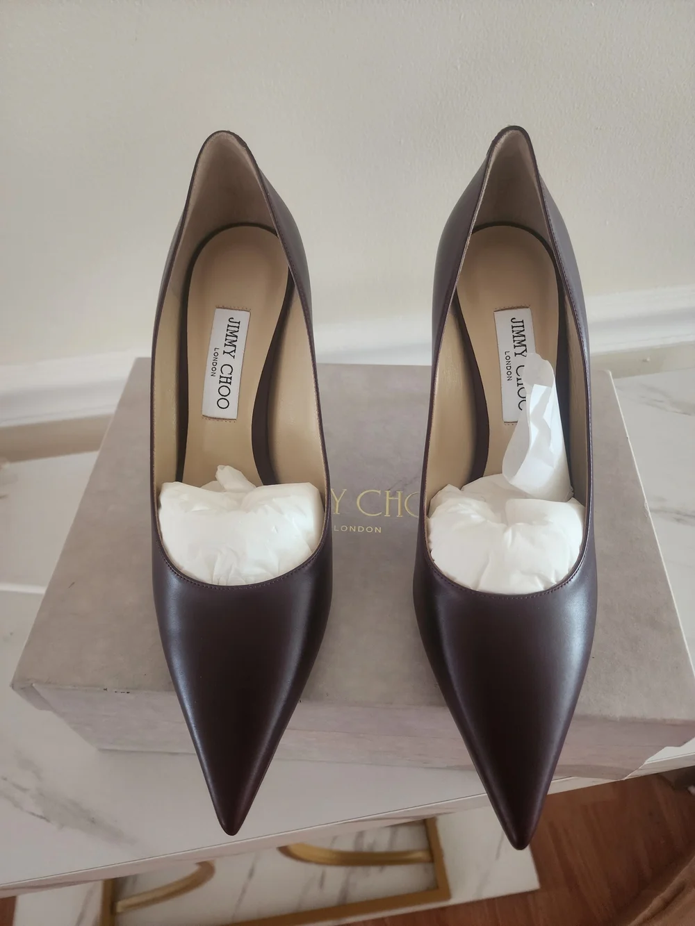 Jimmy Choo Pointed Toe Pumps in Burgundy with Gold Logo